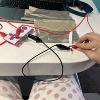 I then used conductive tape connected to a piece of paper with the conductive tape grounded. 